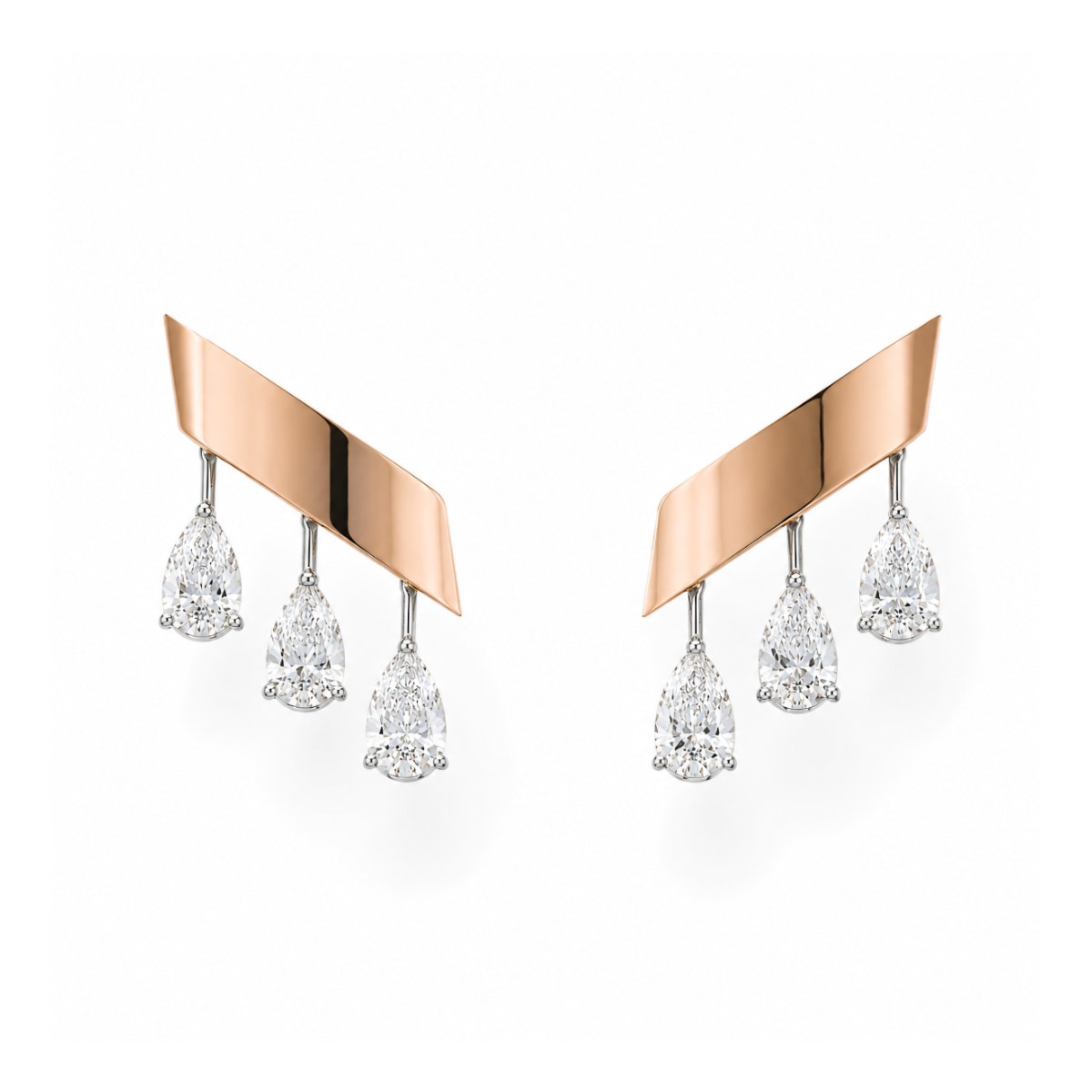 Pair of rose gold earrings with dangling diamond-like stones on a white background